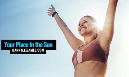 Fitness woman celebrating success in the sun