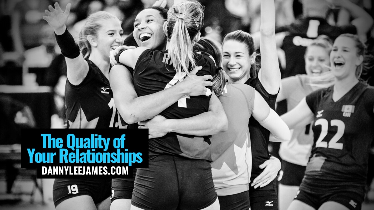 Women's sports team embracing and celebrating quality relationship and happiness